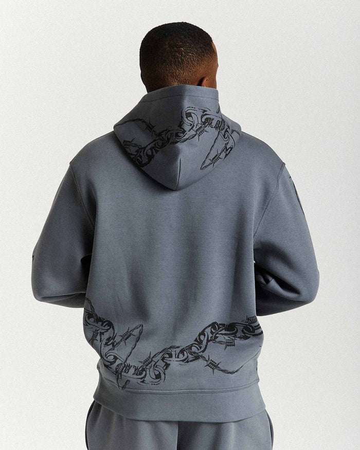 Displays a model wearing the Grey men's Guepard Full Tracksuit