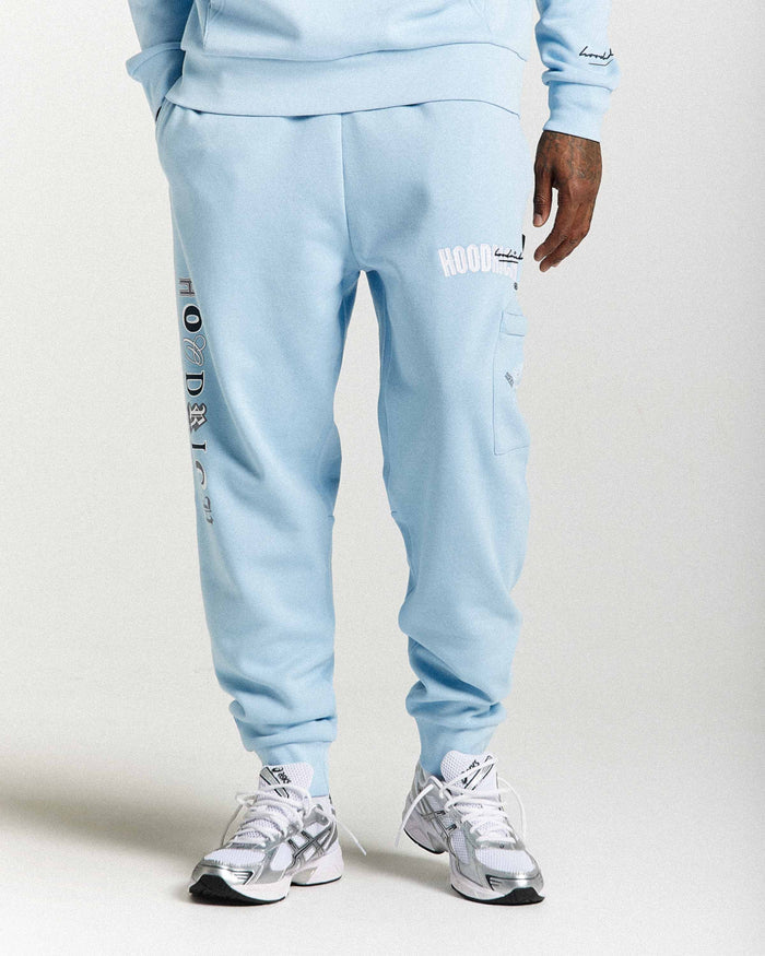 Light blue tracksuit with branding on a white background