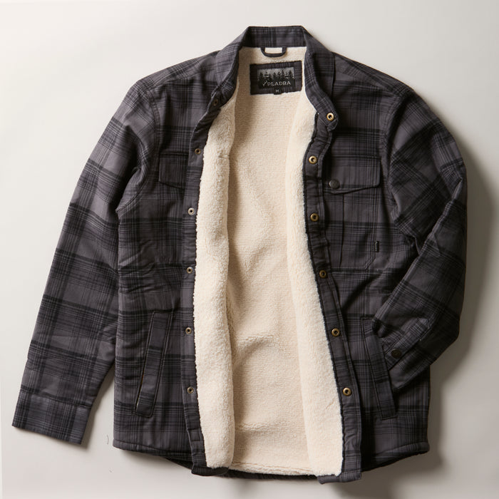 Pladra Men's Northwood Sherpa Insulated Flannel Jacket in Deadwood Black shown open on a white surface.