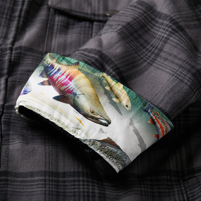 Pladra Men's Northwood Sherpa Insulated Flannel Jacket in Deadwood Black with fish print cuffs.