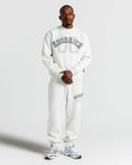 Displays a model wearing the Grey & Black 'Hoodrich' branded men's Rivet Full Tracksuit