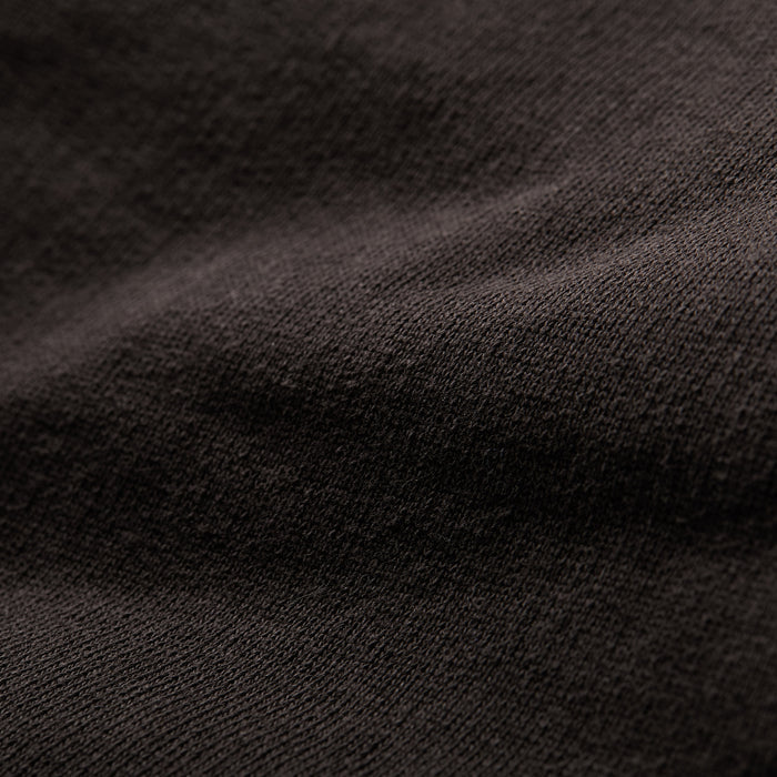 Close-up of Pladra Men's Sierra Hoodie-Charcoal Black, showing heavyweight French terry texture and soft folds.