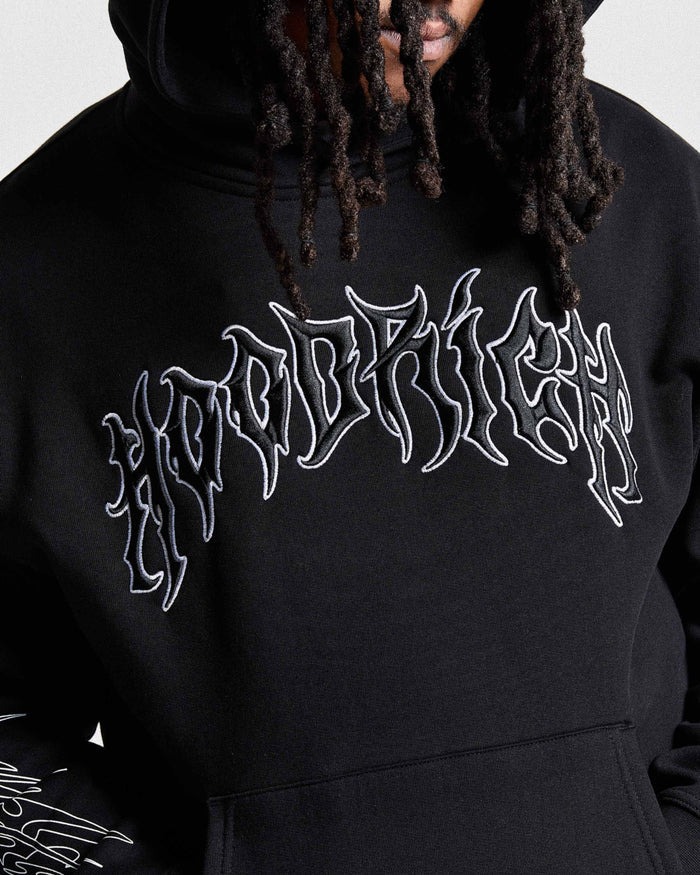 Black hoodie with white embroidered text on a plain background