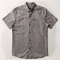 The Pladra Men's S/S Printed Outdoor Aloha Shirt in Steelhead Flies is 100% cotton with a chest pocket and dotted print.