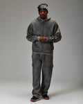 Displays a model wearing the Grey 'Hoodrich' branded men's The Winner's Circle Hazy Full Tracksuit