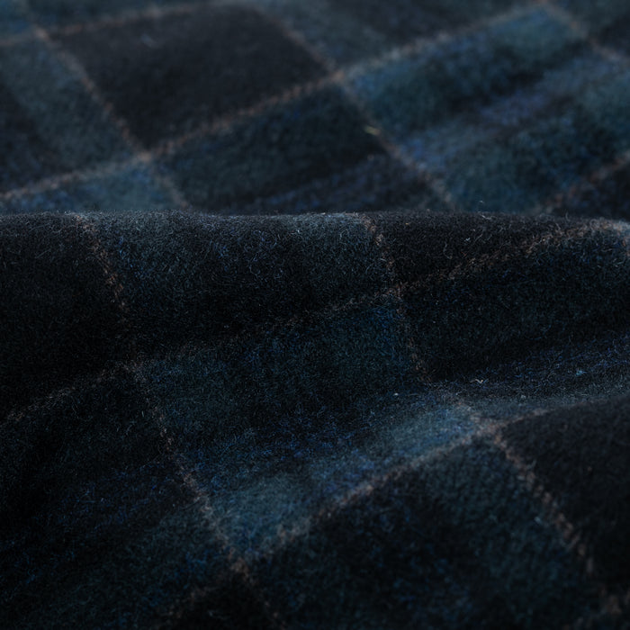 Close-up of Pladra Men’s Workhorse Wool Flannel Shirt in Pacific Black with soft, moisture-wicking, patterned fabric.