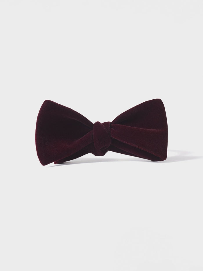 Merlot velvet bow tie, pre-tied, on light grey background
