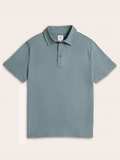 Light blue polo shirt flat lay, front view with two-button placket