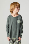 Front view of a boy wearing the Chaser Monster Truck Boys Tee and matching set on a neutral background