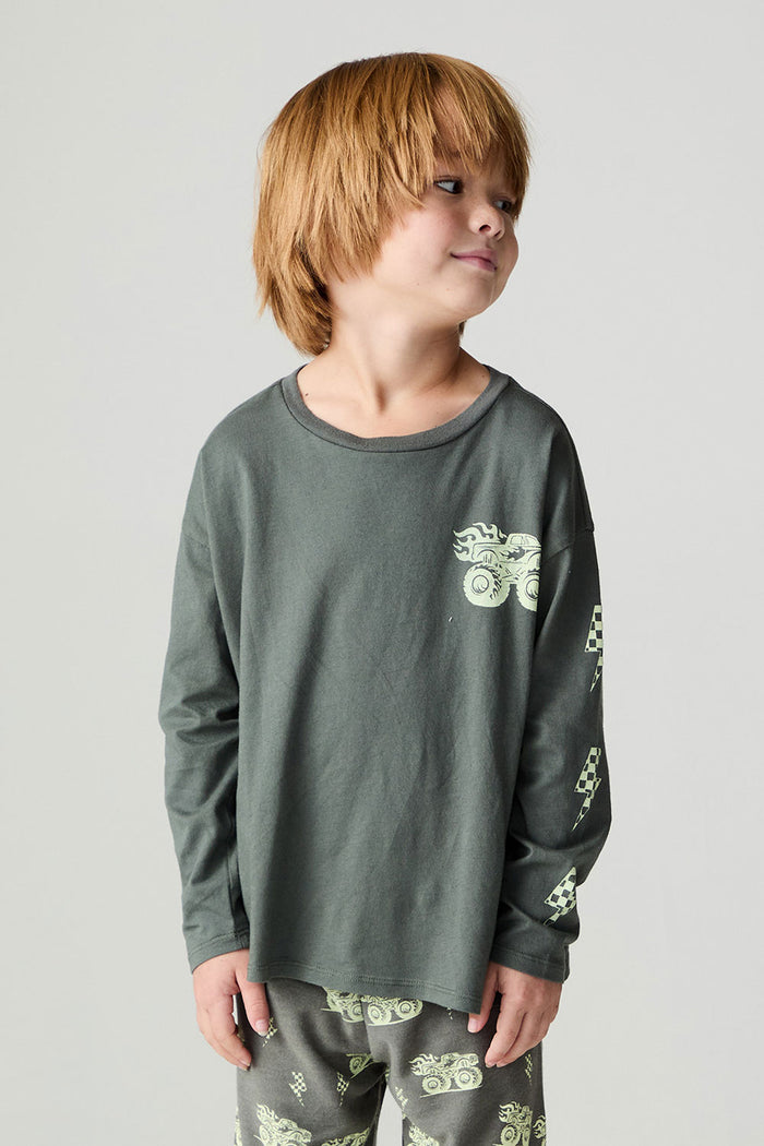 Front view of a boy wearing the Chaser Monster Truck Boys Tee and matching set on a neutral background