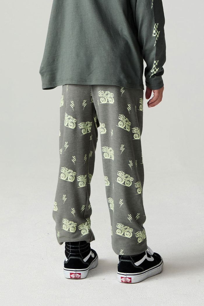 Back view of a boy wearing the Chaser Monster Truck Pants Boys Jogger on a neutral background with arms at sides