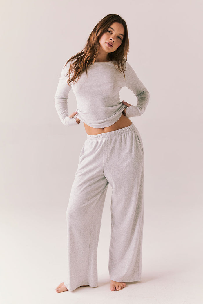 Heather grey ribbed long sleeve top with thumb holes and fitted shape.