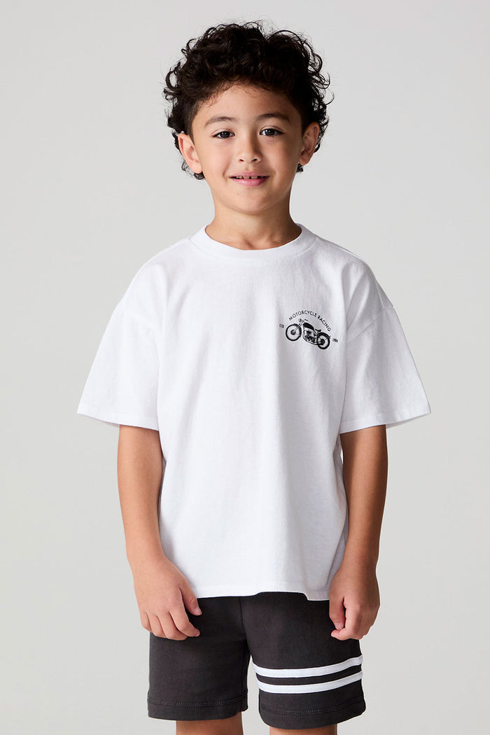 Front view of a boy wearing the Chaser  Motor Racing Tee on a neutral background