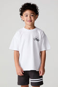 Front view of a boy wearing the Chaser  Motor Racing Tee on a neutral background