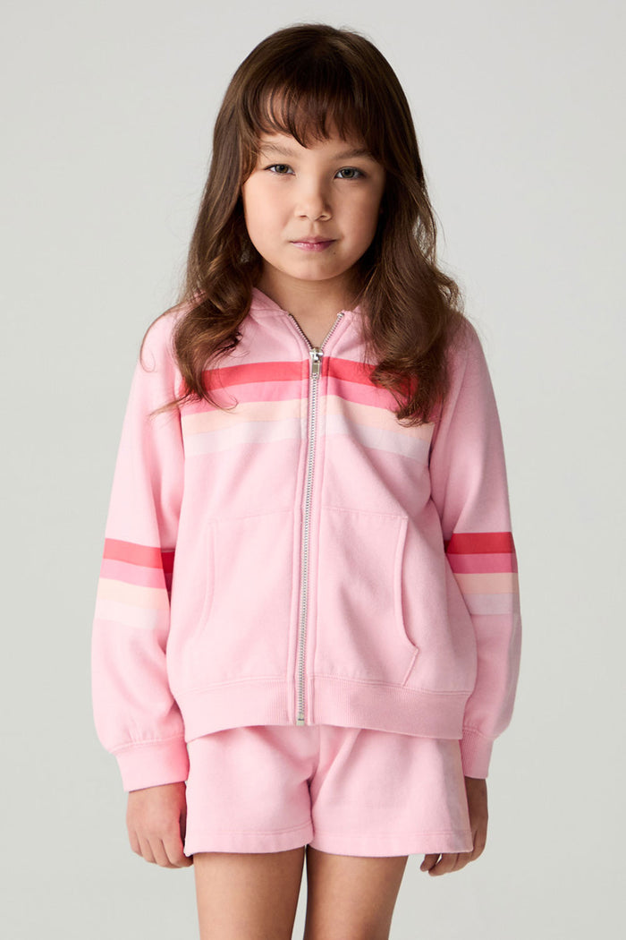 Front view of a girl wearing the Chaser Multi Stripes Girls Zip Up on a neutral background with  matching shorts