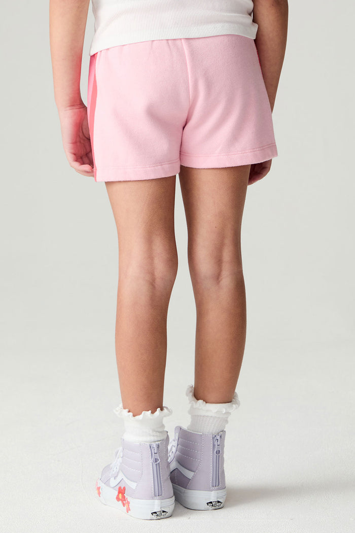 Back view of a girl wearing the Chaser Multi Stripes Shorts Girls Shorts on a neutral background