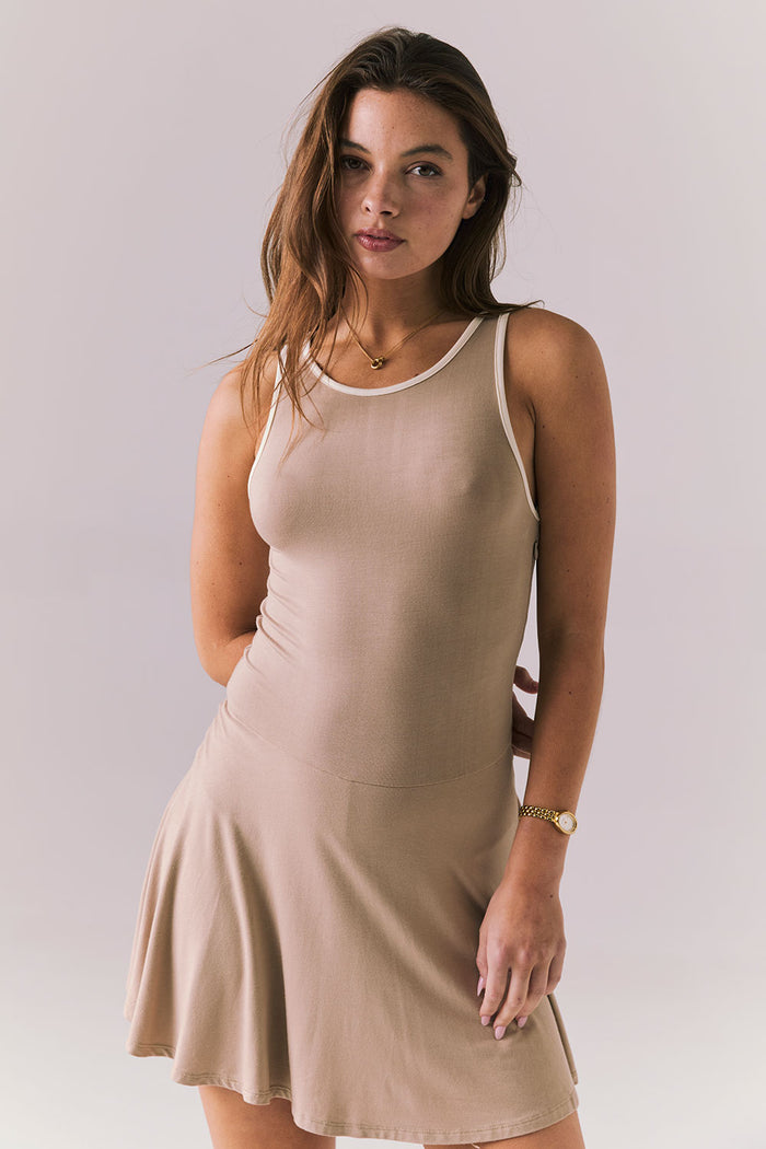 Close up view of Chaser Brand Myrina Iced Coffee Mini Dress showing contrast neckline trim and soft fabric texture