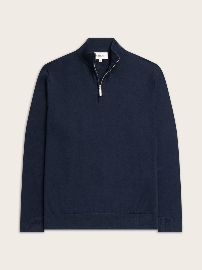 Navy quarter-zip sweater laid flat, front view