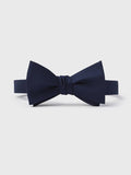 Navy self-tie butterfly bow tie, pre-tied, on light grey background