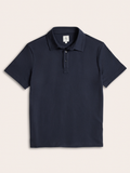 Navy cotton pique polo shirt laid flat, front view, buttoned collar