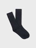 Navy pindot dress socks folded flat, white polka dot pattern