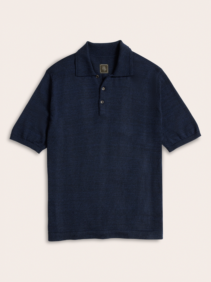 Navy short-sleeve sweater polo laid flat, front view, three-button placket
