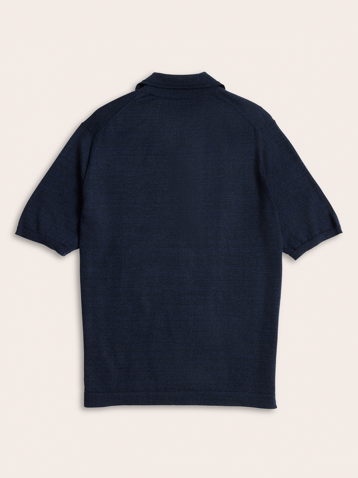 Navy short-sleeve sweater polo laid flat, back view