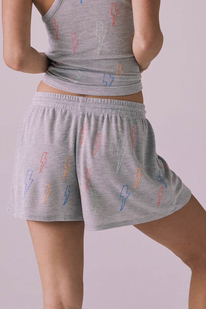 Chaser Neon Bolt Stitches Short in Heather Grey shown from the back with vibrant lightning embroidery across the ribbed knit