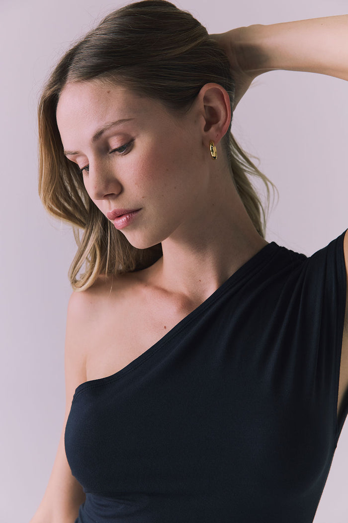 Detail view of the Nice Tank in Licorice Black highlighting the gathered ruching along the waist