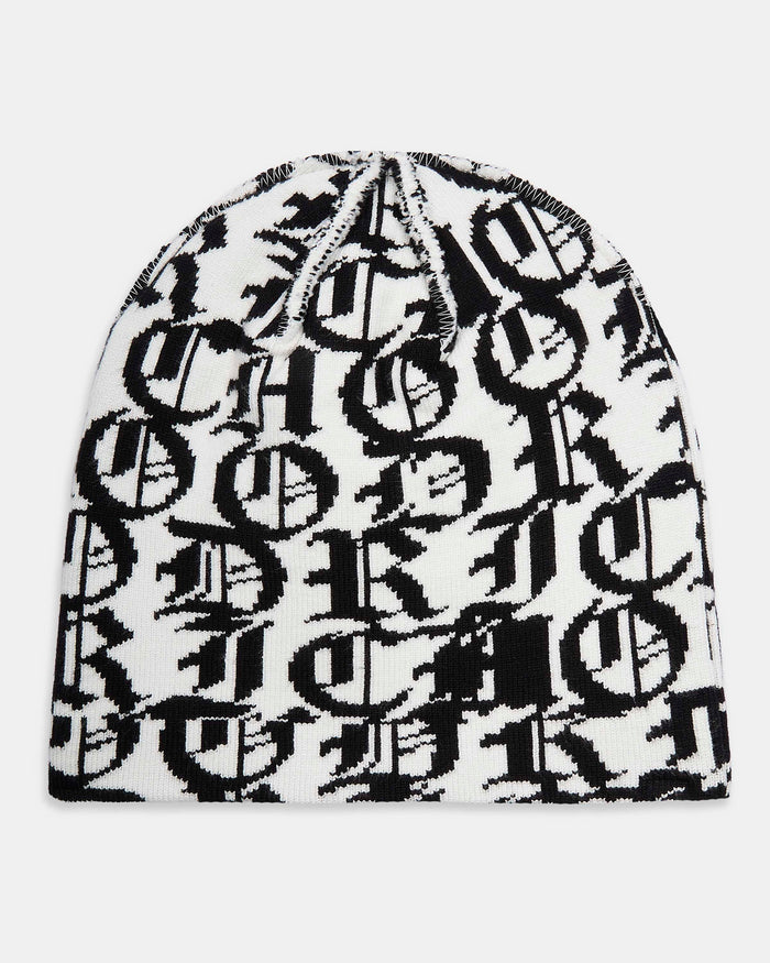 Black and white patterned beanie on a light gray background