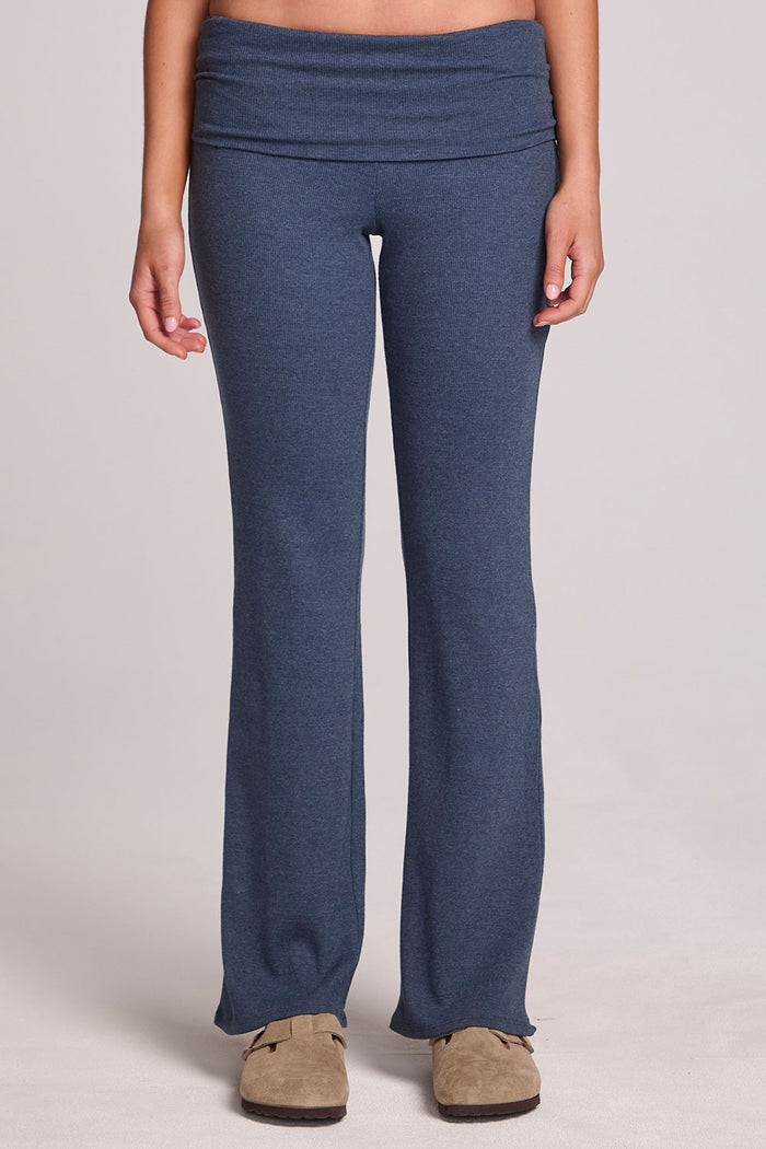 Front view of a woman wearing the Chaser Noorh Dark Denim Pants with arms at side