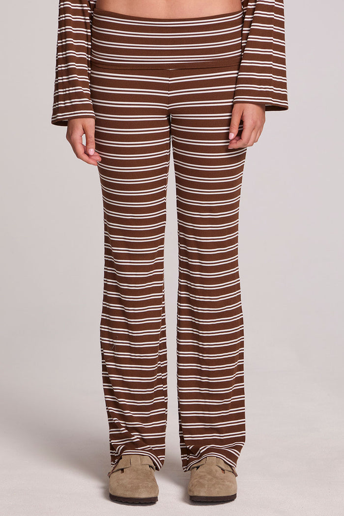 Front view of a woman wearing the Chaser Noorh Nutty Brown Stripe Pants on a neutral background with arms at sides