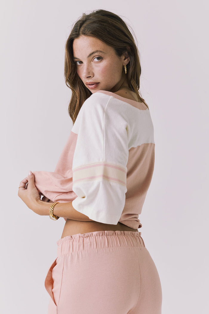 Chaser Palmer Tee in Starry White and Delicate Honey shown 3/4 side angle highlighting the easy drape through the body and contrast sleeve panels