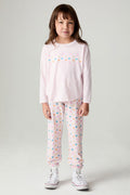 Full body front view of a girl wearing the Chaser Party Hearts Girls Jogger on a neutral background with hands at sides and matching shirt