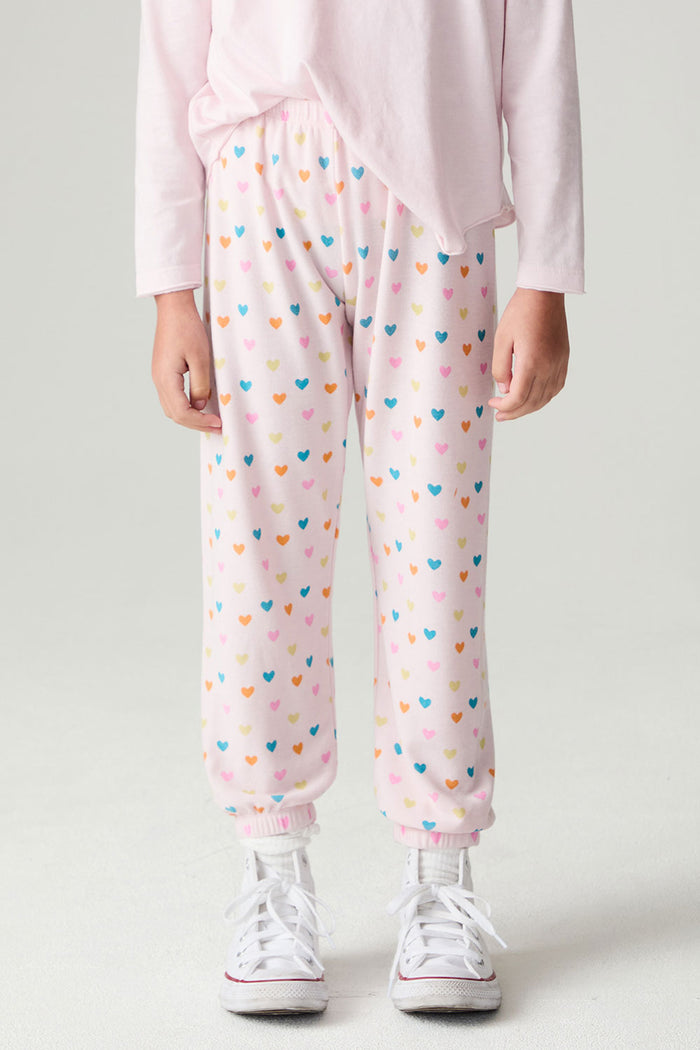 Front view of a girl wearing the Chaser Party Hearts Girls Jogger on a neutral background with hands at sides and shirt