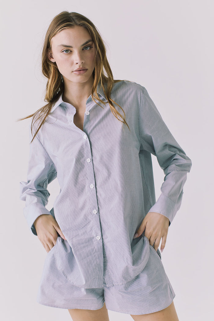 Chaser Paso Pinstripe Button Up in Navy shown from angled front highlighting fluid lightweight fabric and easy drape