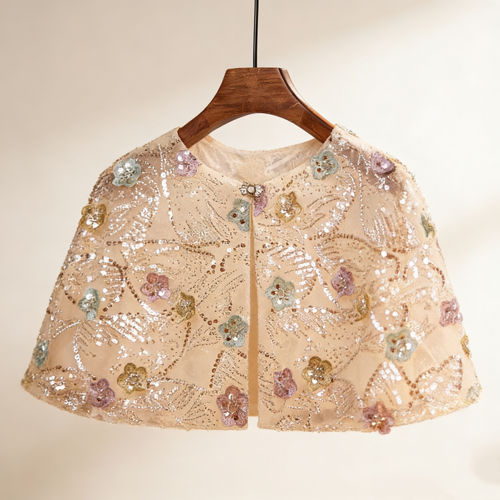 Handmade pastel floral bridal cape with delicate bead embroidery and sequins.