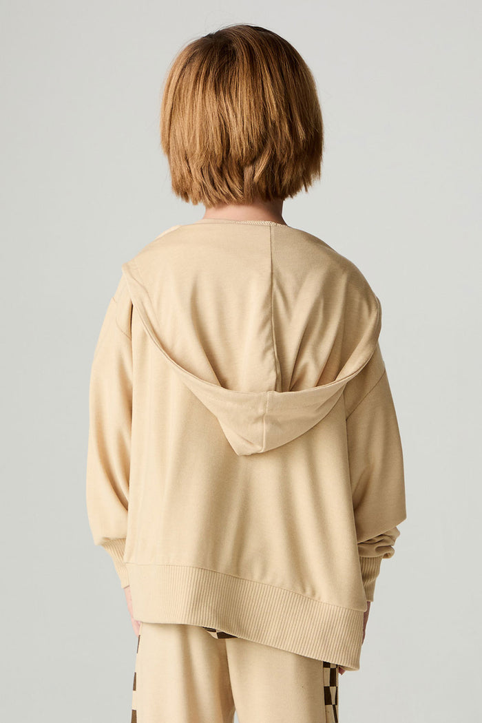 Back view of a boy wearing the Chaser Paxton Zip Up Hoodie Boys Zip Hoodie on a neutral background with pants