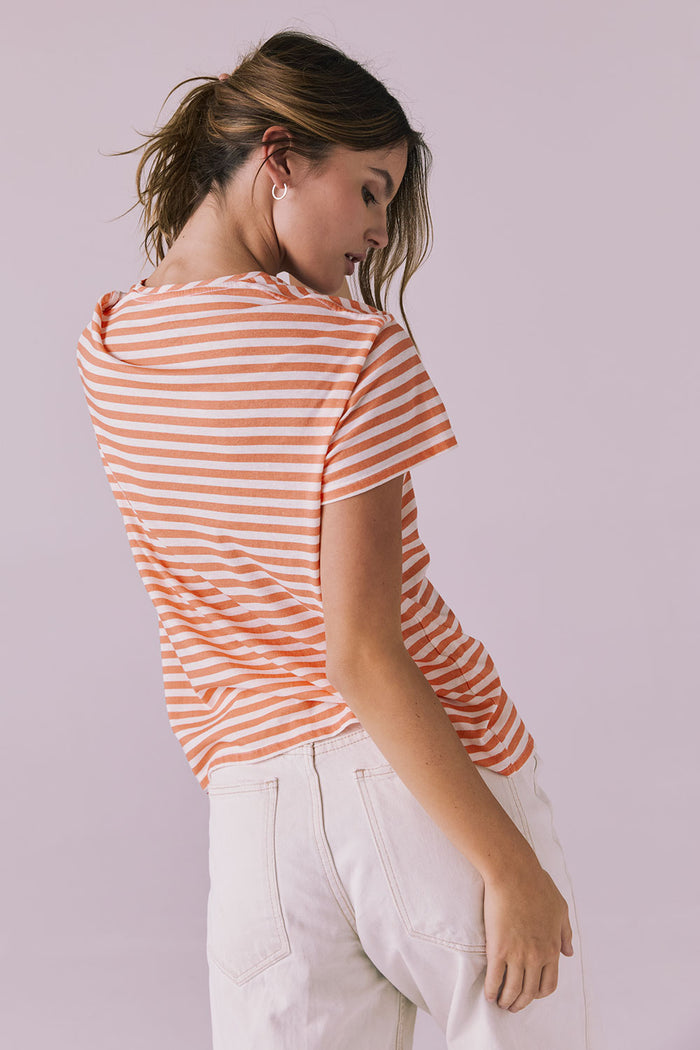 Back and turned angle of the Peace + Love Embroidery Tee in Poppy Stripe highlighting the stripe pattern and relaxed fit