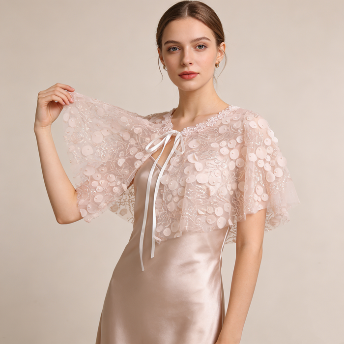 Hand embellished pink wedding cape with sparkling sequin details, lightweight bridal shoulder cover.
