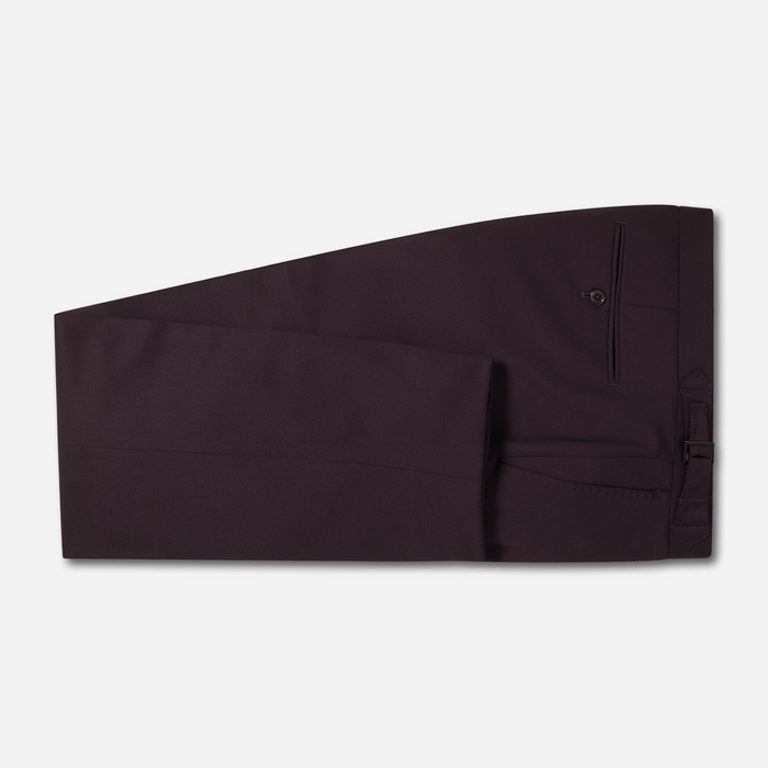 Plum tuxedo trousers folded flat, side view, on light grey background