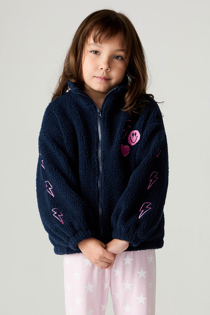 Front view of a girl wearing the Chaser Power Love Girls Jacket on a neutral background with pink pants