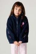 Front view of a girl wearing the Chaser Power Love Girls Jacket on a neutral background with pink pants