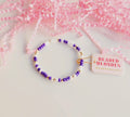 Purple and white beaded blonde