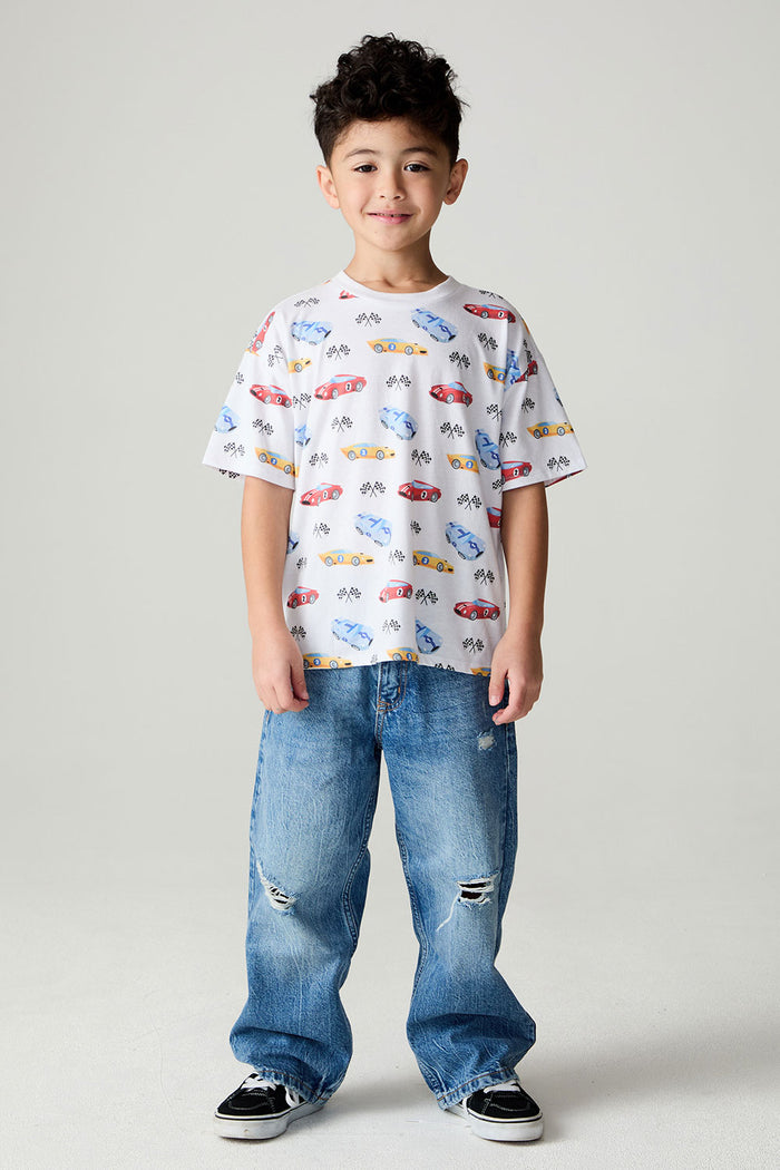 A full body front view of a boy wearing the Chaser Race Day Boys Tee on a neutral background