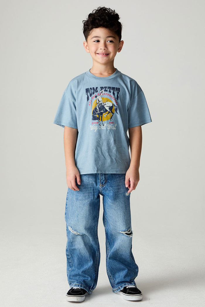 A full body front view of a boy wearing the Chaser Racers Boys Tee on a neutral background