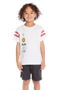 Boy wearing the Chaser Kids Racing Symbols Tee in white with red stripes and graphic designs on a white background