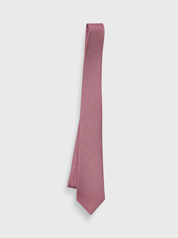 Raspberry silk necktie draped with a subtle diagonal weave on a grey background