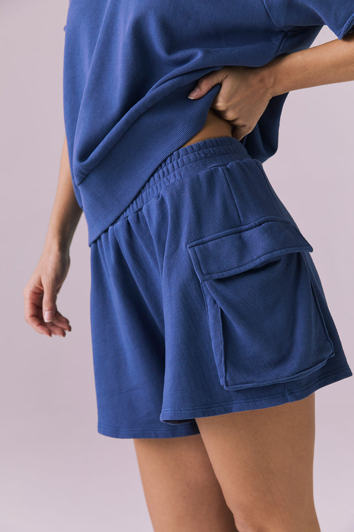 Chaser Rileyy Honest Indigo Shorts side detail close up focusing on cargo pocket design