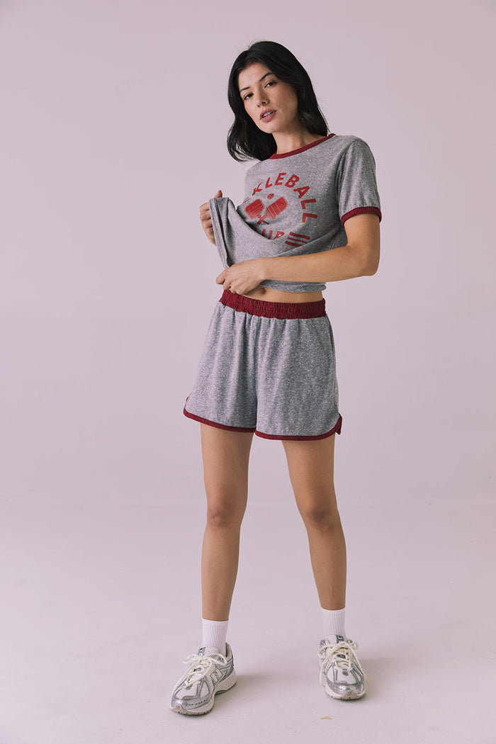 Full body view of the Chaser Ringer Shorts in Heather Grey with Crimson trim styled with the matching Pickleball Club Tee